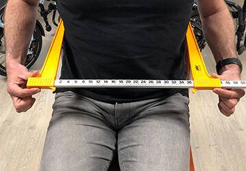 Rompbreedte opmeten.