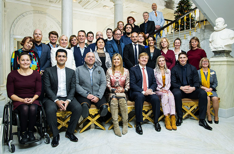 Foto van de uitblinkerslunch met de Koning en Koningin